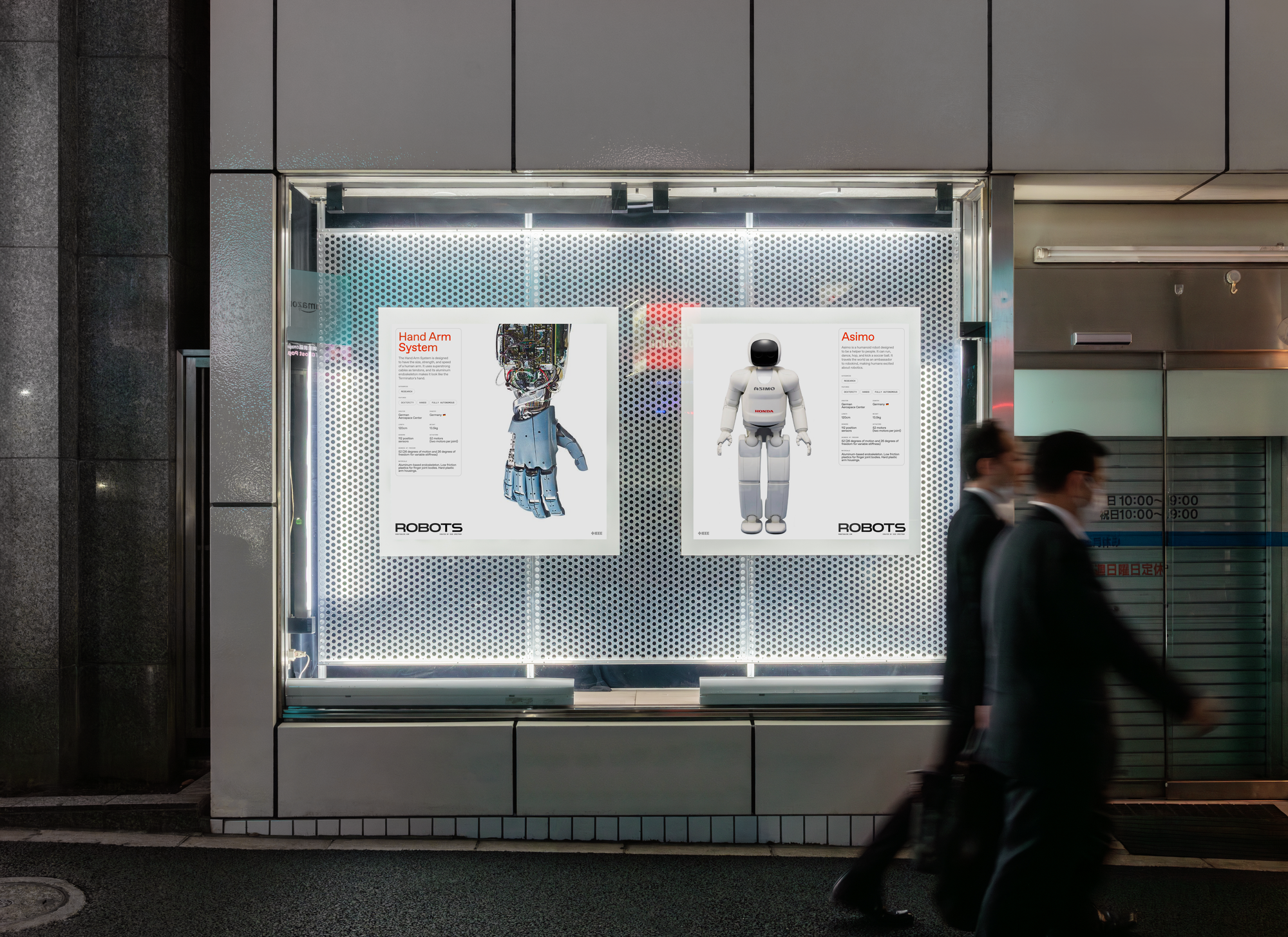 Two posters with information about two robots is shown on display on a city street