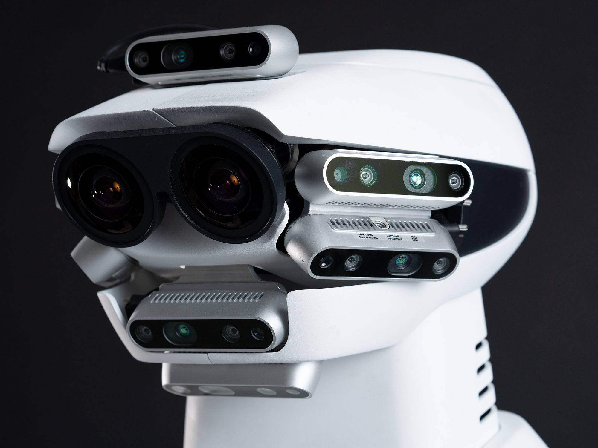A close-up of the GITAI G1 robots' head highlighting a multitude of cameras and sensors