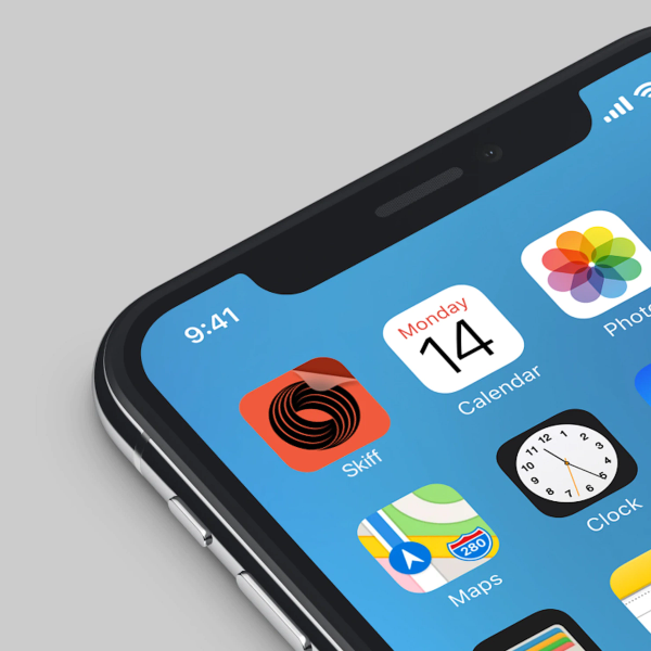 Corner of iPhone showing grid of apps